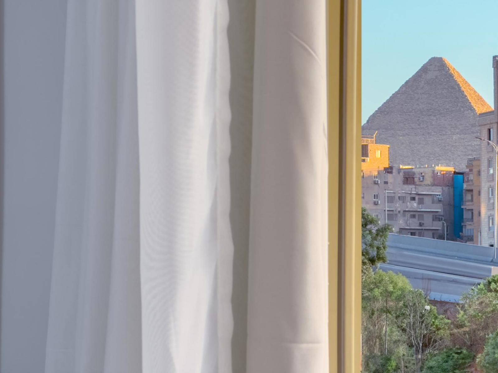 Kafret el-Gabal Royal Crown Hotel Giza Pyramids View מראה חיצוני תמונה