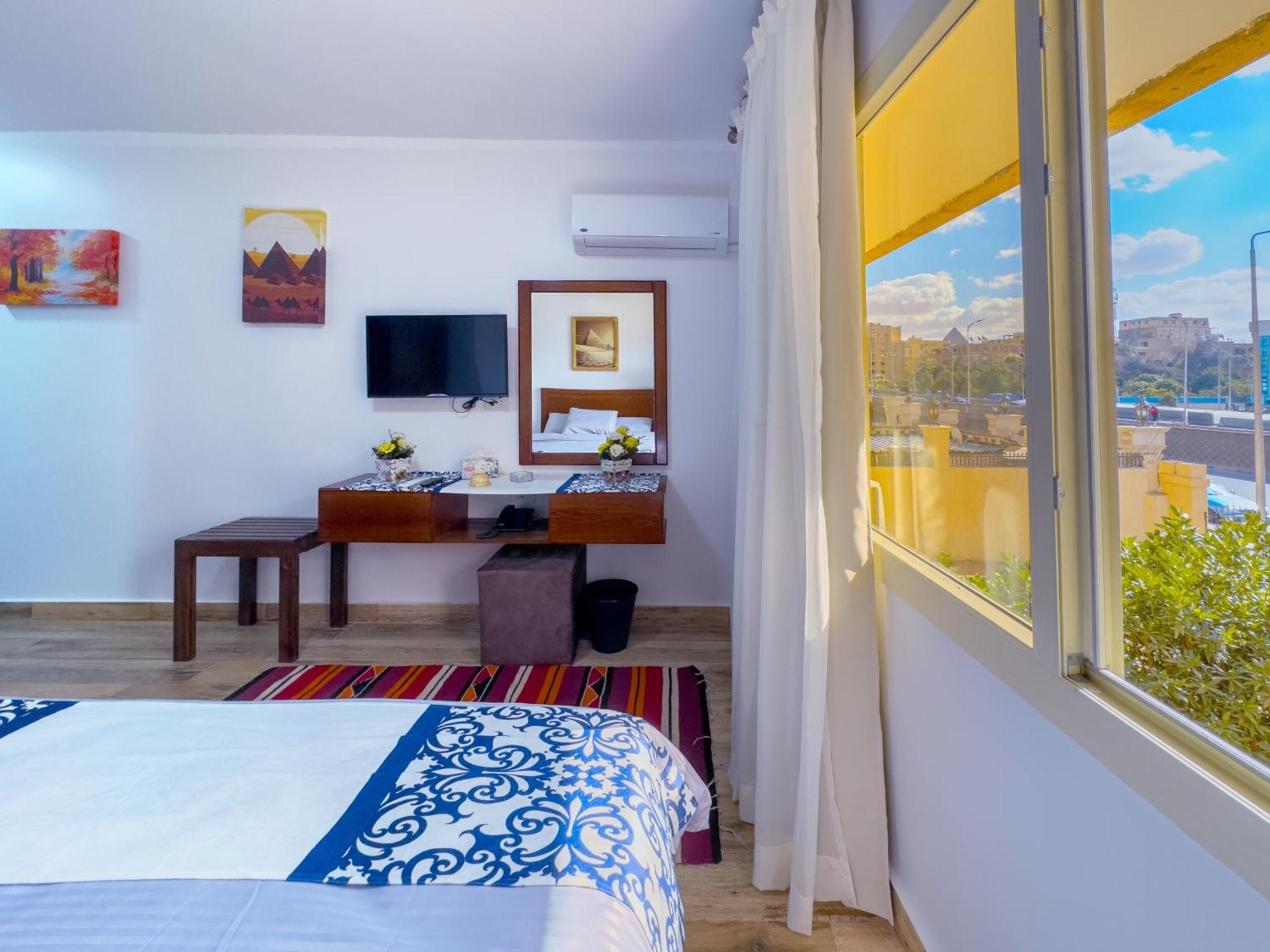 Kafret el-Gabal Royal Crown Hotel Giza Pyramids View מראה חיצוני תמונה