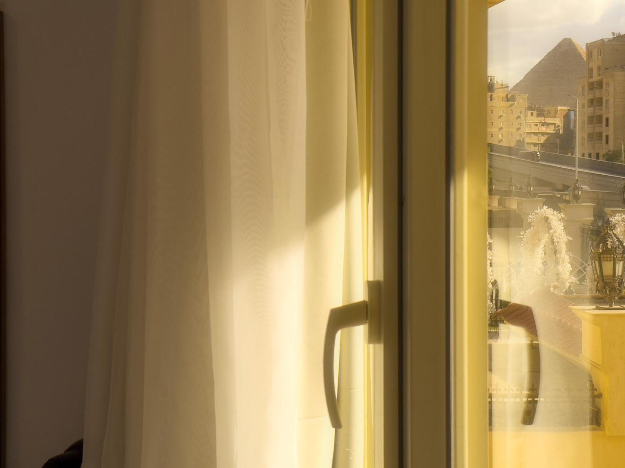 Kafret el-Gabal Royal Crown Hotel Giza Pyramids View מראה חיצוני תמונה